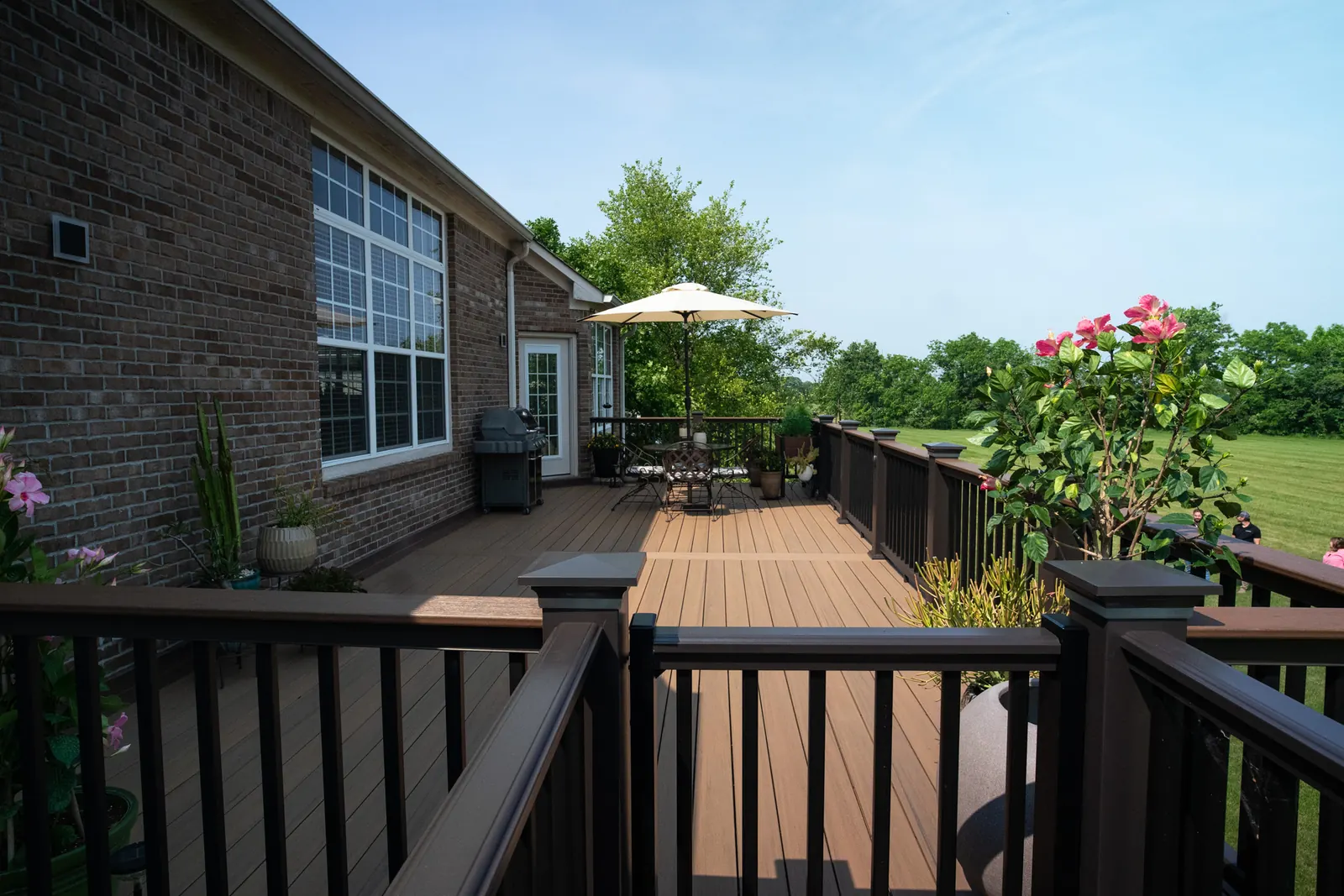 Composite deck table flowers top view in Westfield.