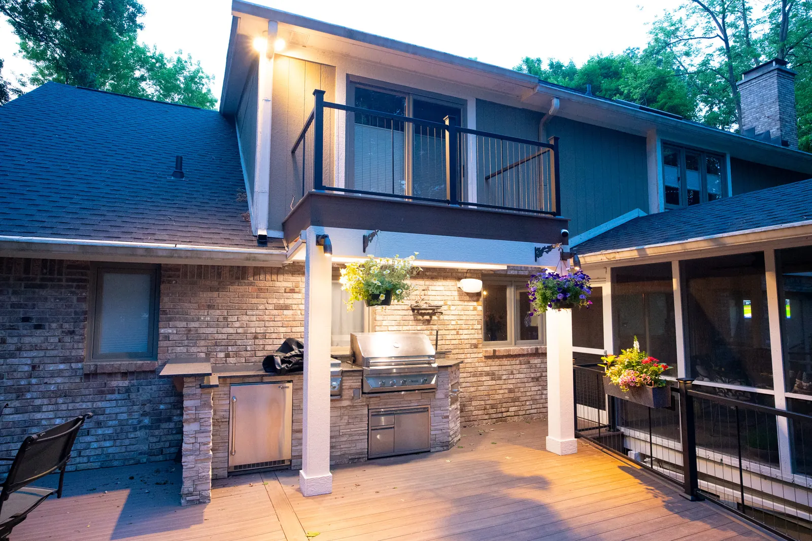 PVC deck with outdoor kitchen and under-deck drainage at Geist in Fishers.