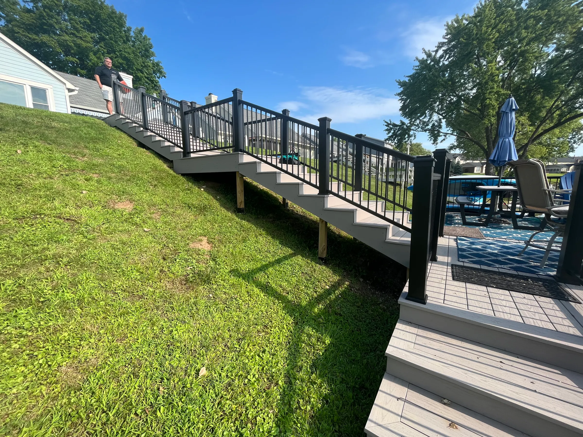 Composite stairs from a deck down to a boat dock in Indianapolis.