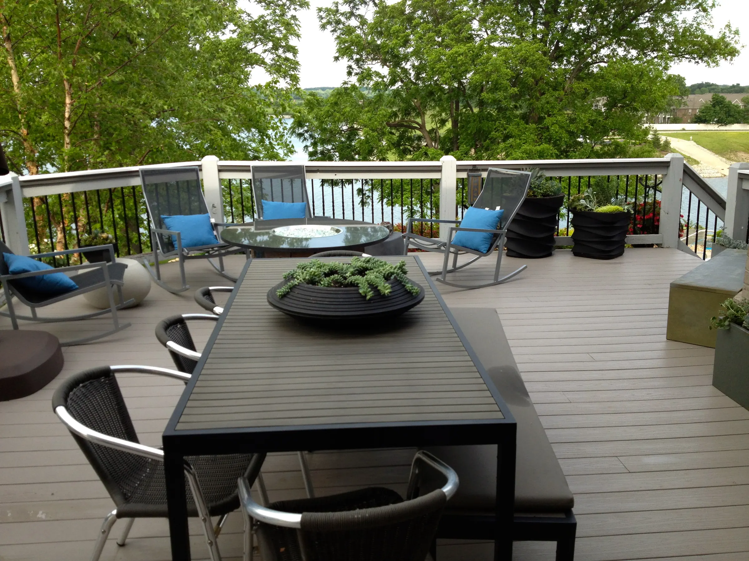 Elevated composite deck dining space on the water in Noblesville.