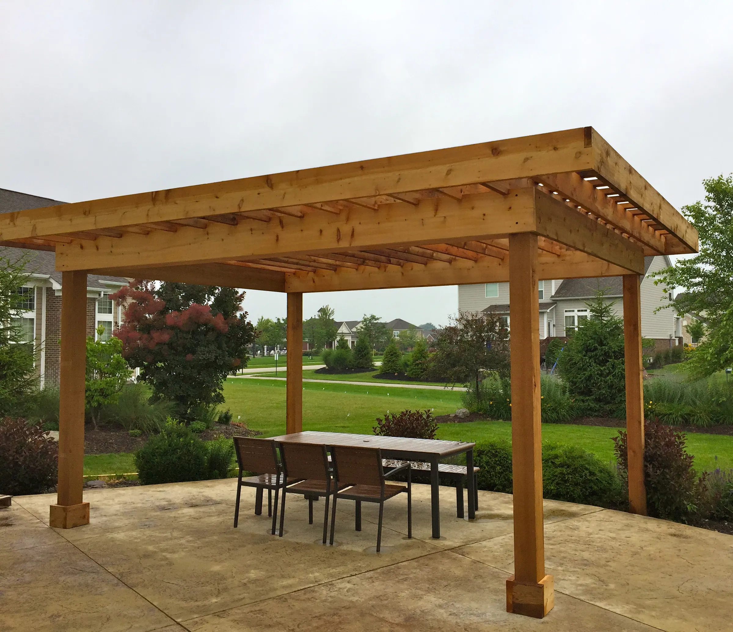 Modern pergola patio outdoor dining in Zionsville.