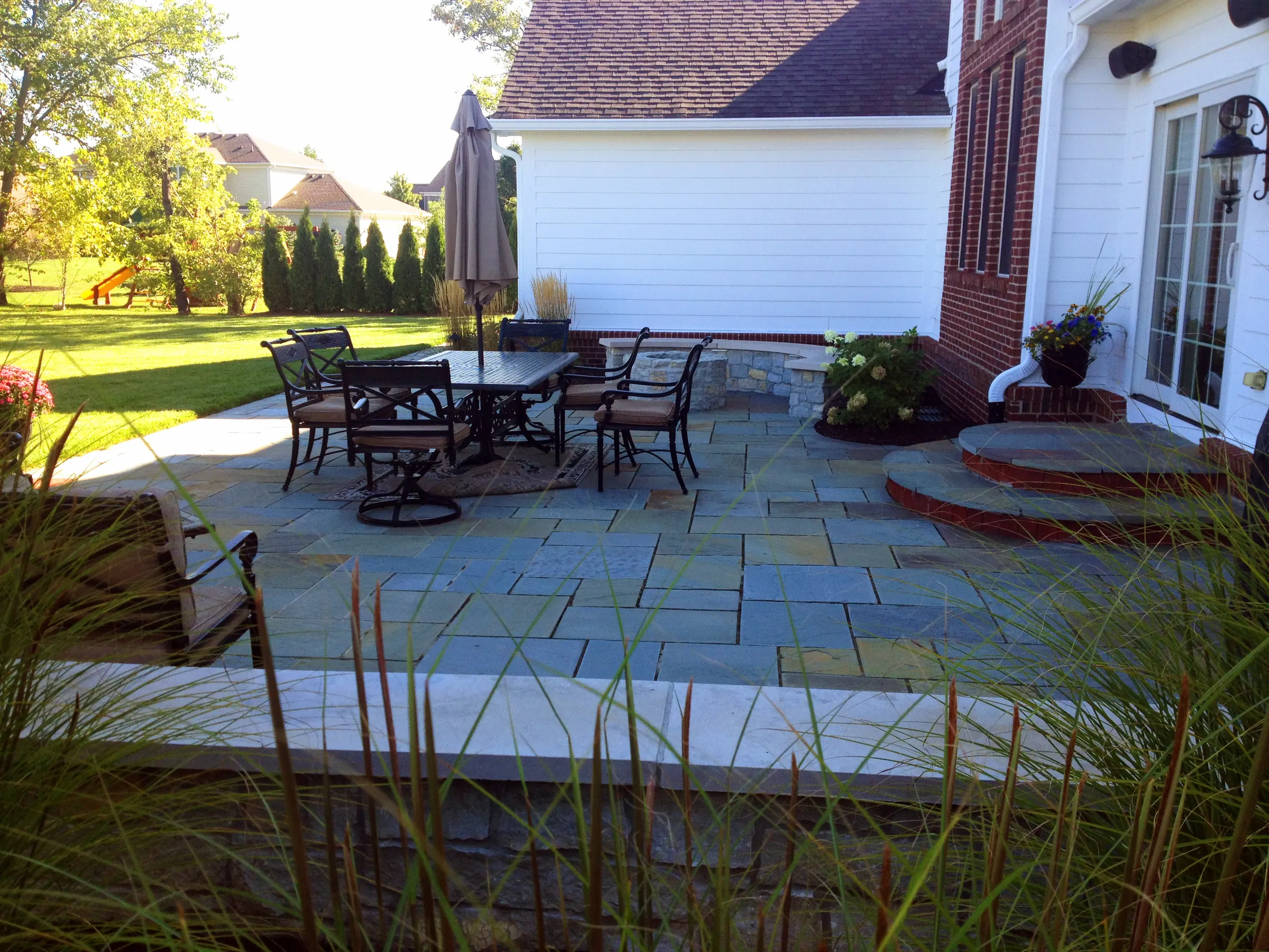 Paver patio with outdoor dining area in Carmel.
