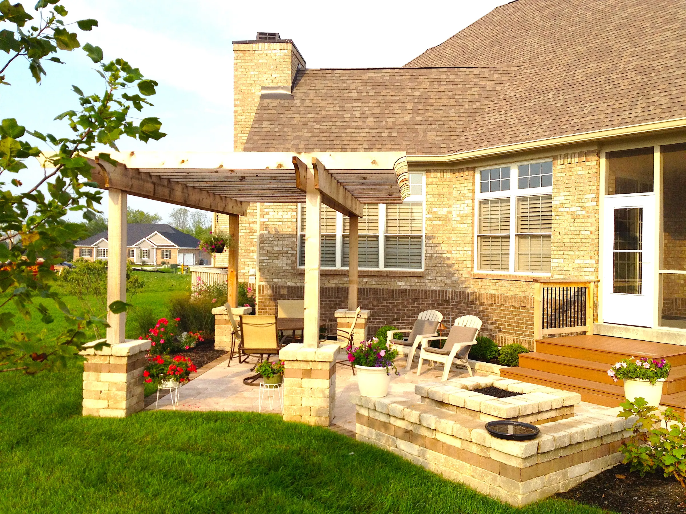 Pergola with fire pit and paver patio in Westfield.